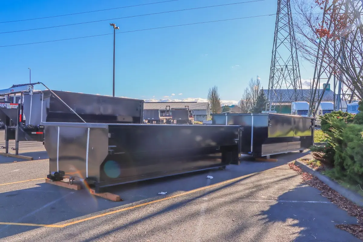 Roll-off dumpster ready for waste disposal at job site for 4 Yard Dumpster Rental in Birmingham